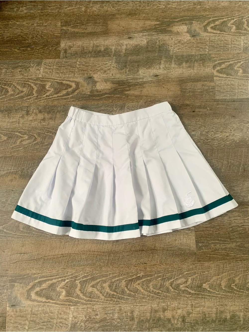 White Pleated Blokecore Tennis Skirt with Green Stripe by Boast